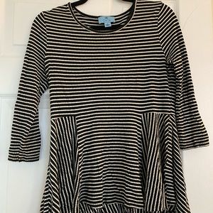 Quarter length sleeve black and white striped top